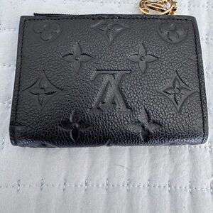 Louis Vuitton Lisa Wallet in Black Empreinte Leather